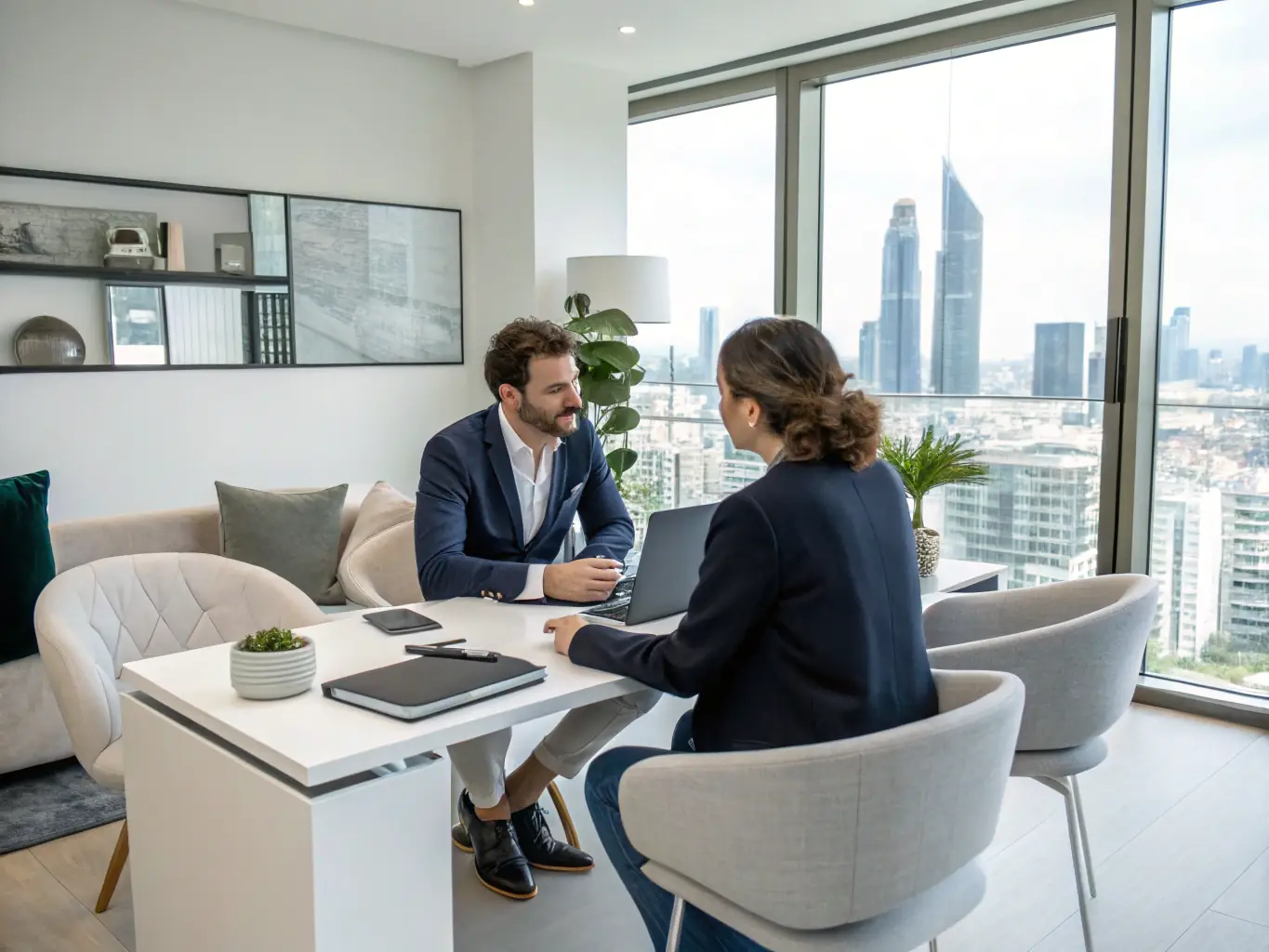 A professional agent consulting with a client in an office setting, with federal building images in the background, representing federal bail bonds.